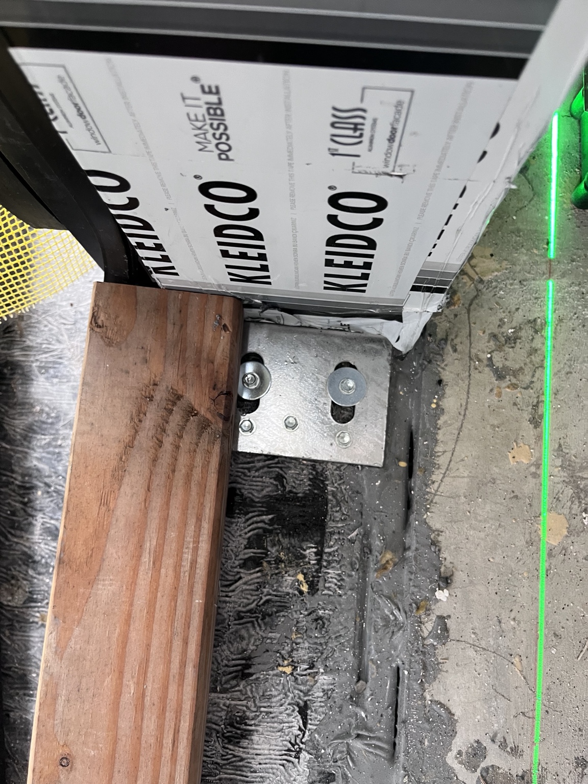 Window anchoring and laser layout detail at 179 N 10