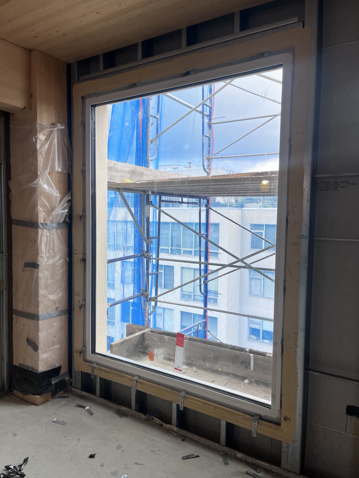 Completed window installation viewed from the interior at 179 N 10